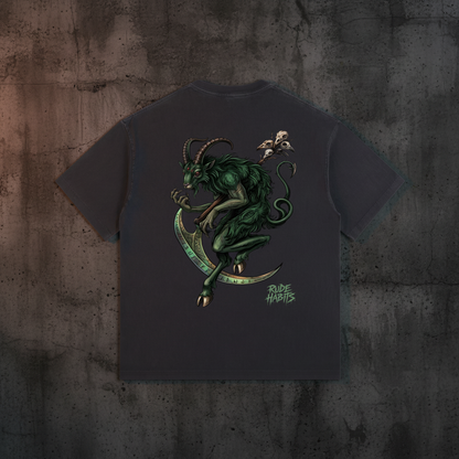 A black short-sleeve t-shirt with a large graphic print on the back featuring a green horned demon riding a crescent moon, with a small figure on its head and the text 'Rude Habits' printed below.