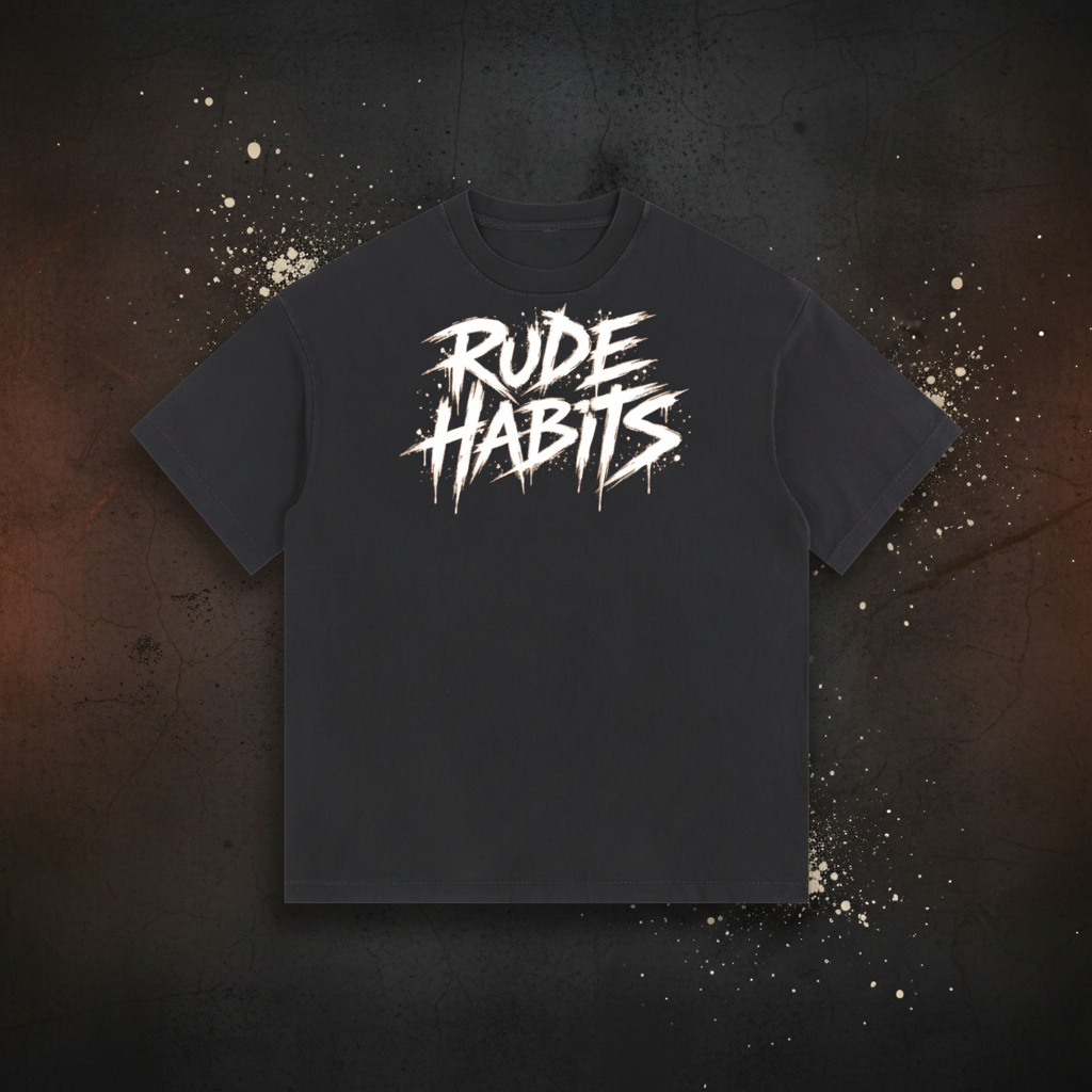 A black short-sleeve t-shirt with a distressed white graphic on the chest reading 'RUDE HABITS' in a stylized, spray-paint-like font, shown against a plain white background.
