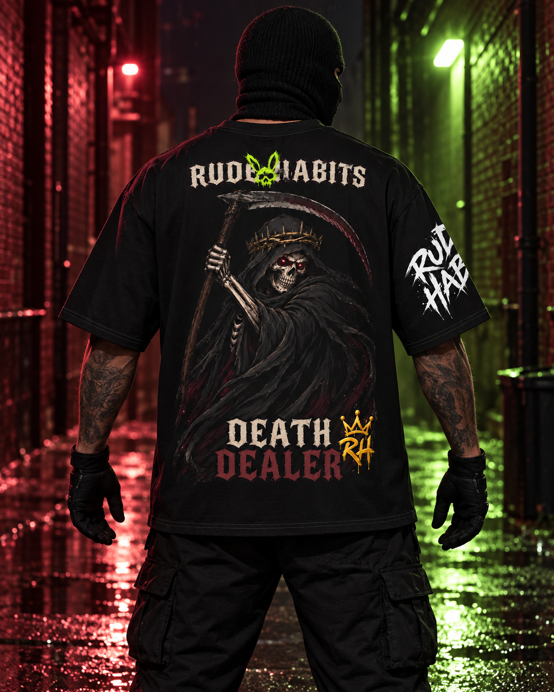 A person shown from behind wearing a black graphic t-shirt in a rainy, neon-lit alleyway. The shirt features a large Grim Reaper graphic with the text 'RUDE HABITS' and 'DEATH DEALER' on the back, along with a white graphic on the sleeve.