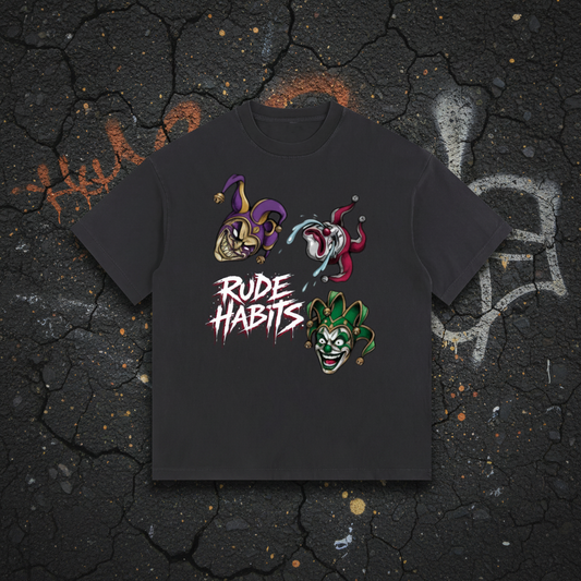 A black short-sleeve t-shirt with a graphic print featuring three jester heads and the text 'RUDE HABITS' in a stylized font, displayed on a solid white background.